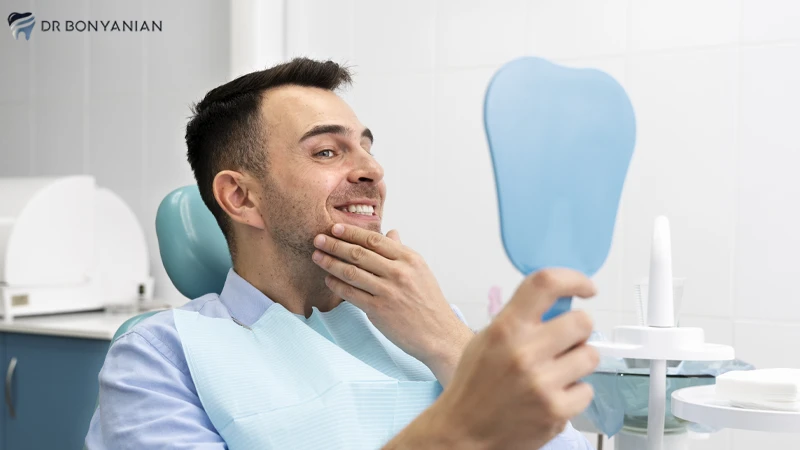 آیا ایمپلنت دندان لق می‌شود؟