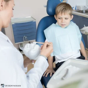 درمان ریشه دندان شیری کودکان